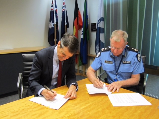 AHPRA CEO Martin Fletcher and WA Police AC Gary Budge sign MOU Dec 2018